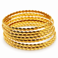 7 Bracelets Rigides Torsadés
