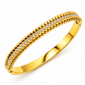 Bracelet Rigide Ronds Dorés et Cristaux Luxe