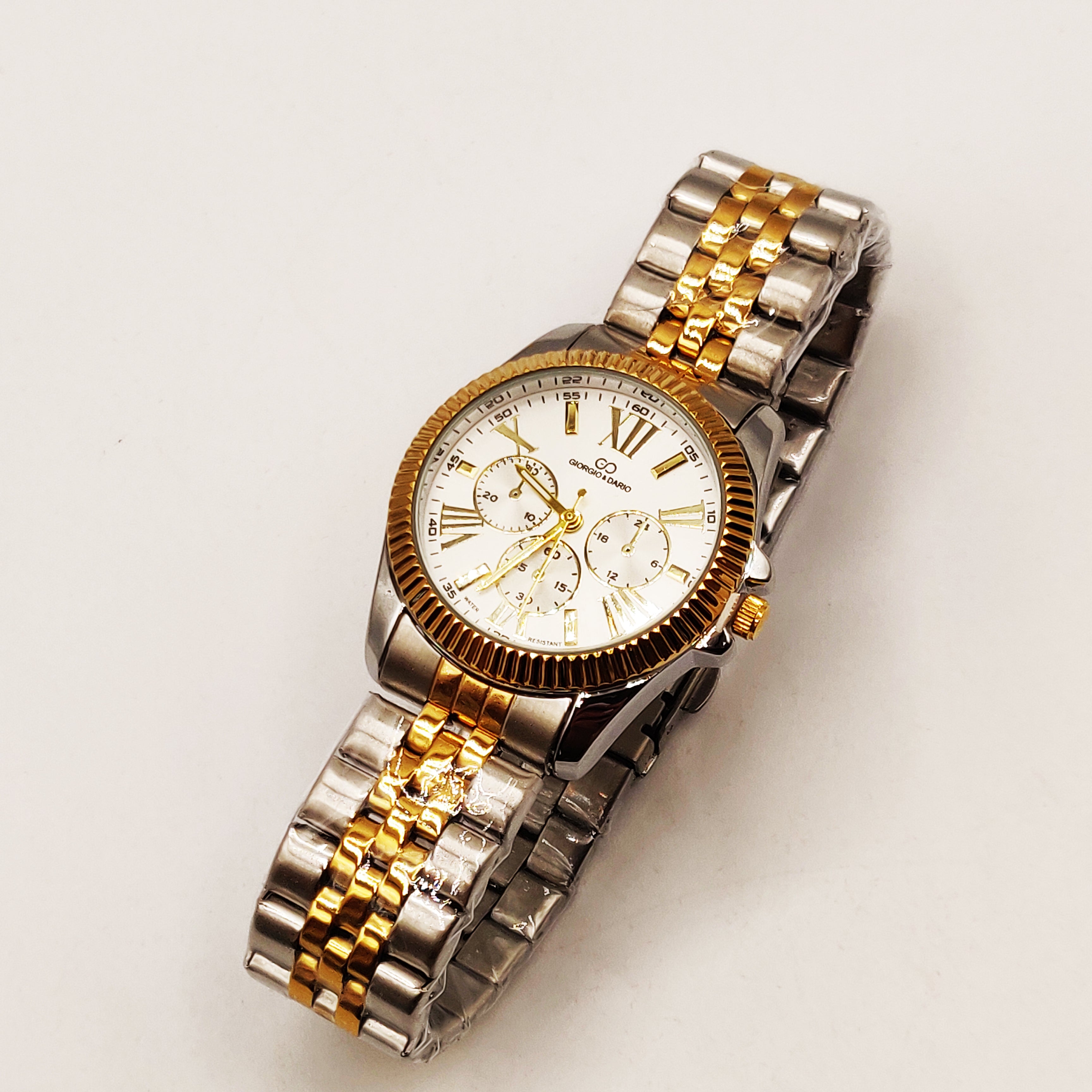 Montre HC EU6441 Fond Blanc Bracelet Argenté et Doré