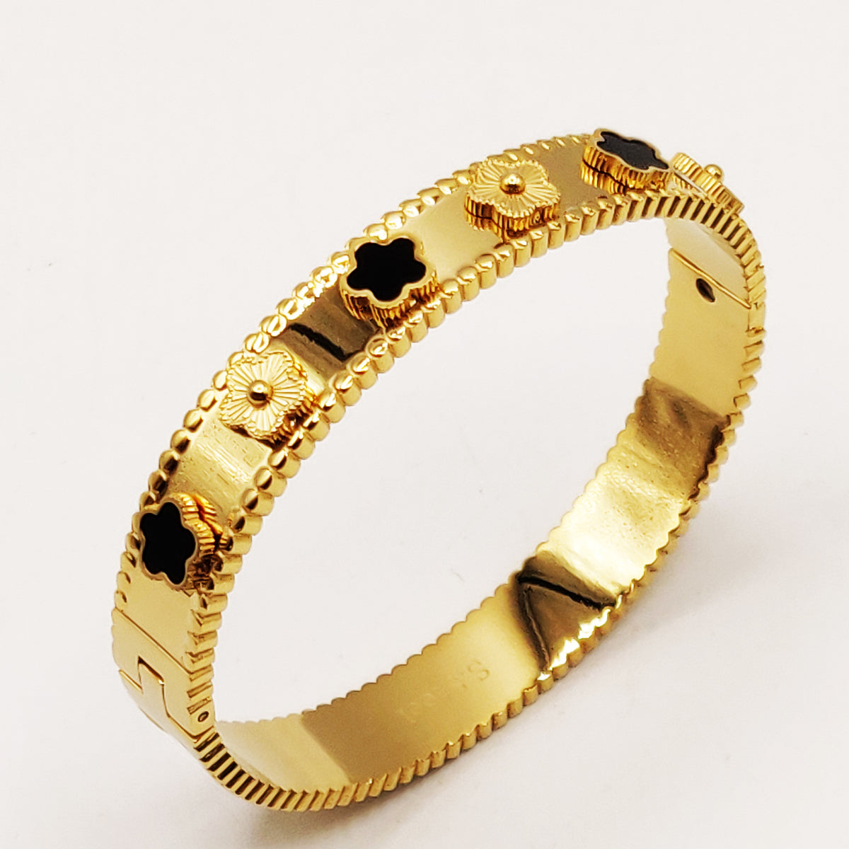 Bracelet Rigide Marguerites Dorées et Noires Luxe