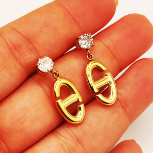 Boucles d'oreilles H Luxe et Cristaux