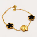 Bracelet Marguerites Dorées et Noires Tour Perles d'imitation Luxe
