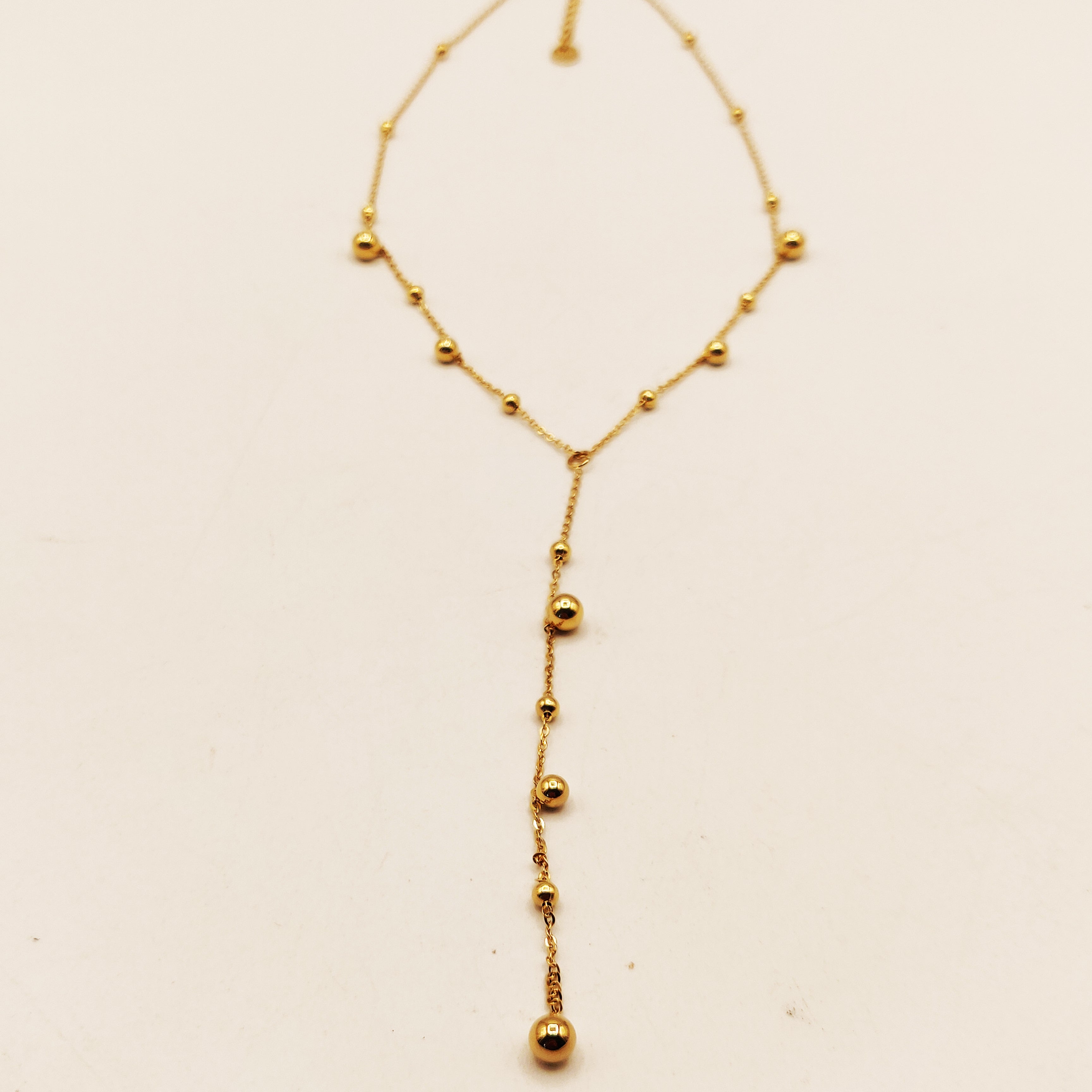 Collier Multi Perles d'imitation Dorées Descendant