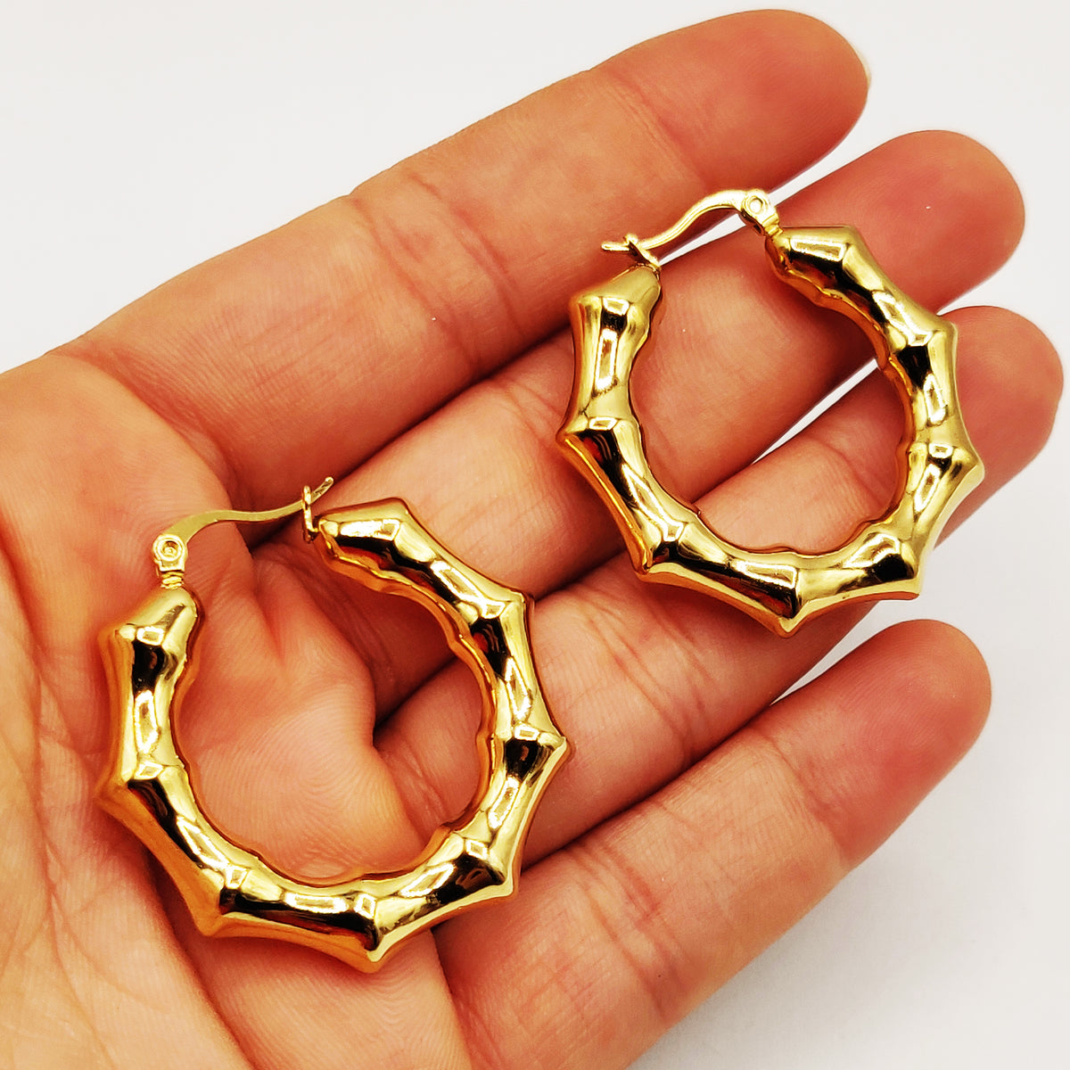 Boucles d'oreilles Os Luxe