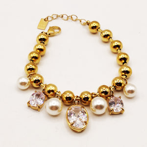 Bracelet Perles d'imitation Dorées Pendentifs Perles d'imitation Blanches et Gros Cristaux Luxe