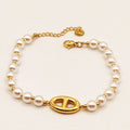 Bracelet H Luxe Perles d'imitation Blanches