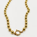 Collier Grosses Perles d'imitation Dorées et Cercle Luxe