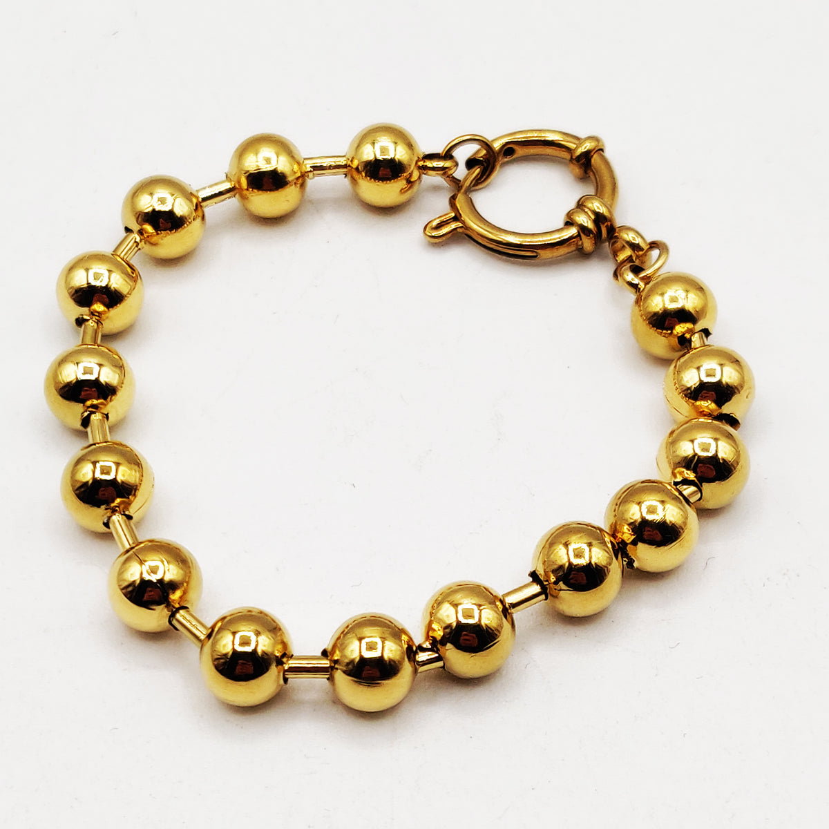 Bracelet Grosses Perles d'imitation Dorées et Cercle Luxe