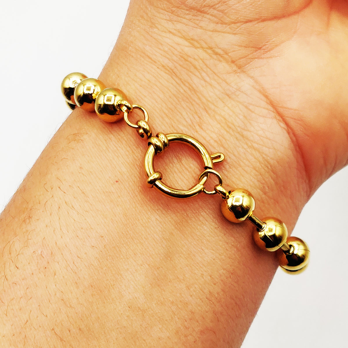 Bracelet Grosses Perles d'imitation Dorées et Cercle Luxe