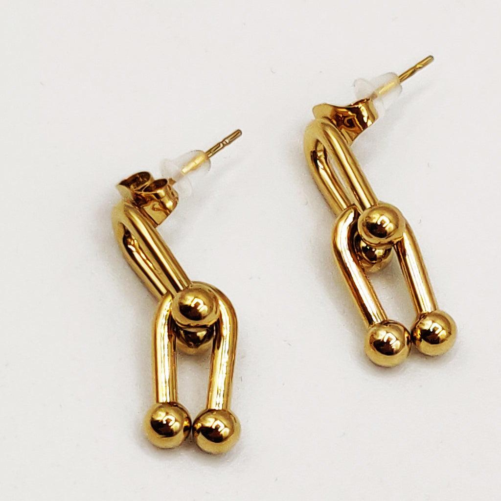 Boucles d'oreilles T Luxe