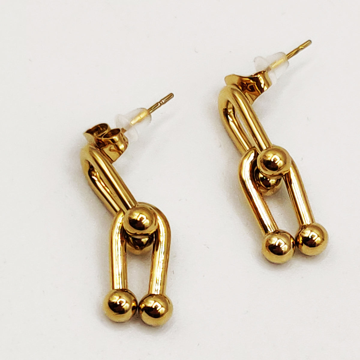 Boucles d'oreilles T Luxe