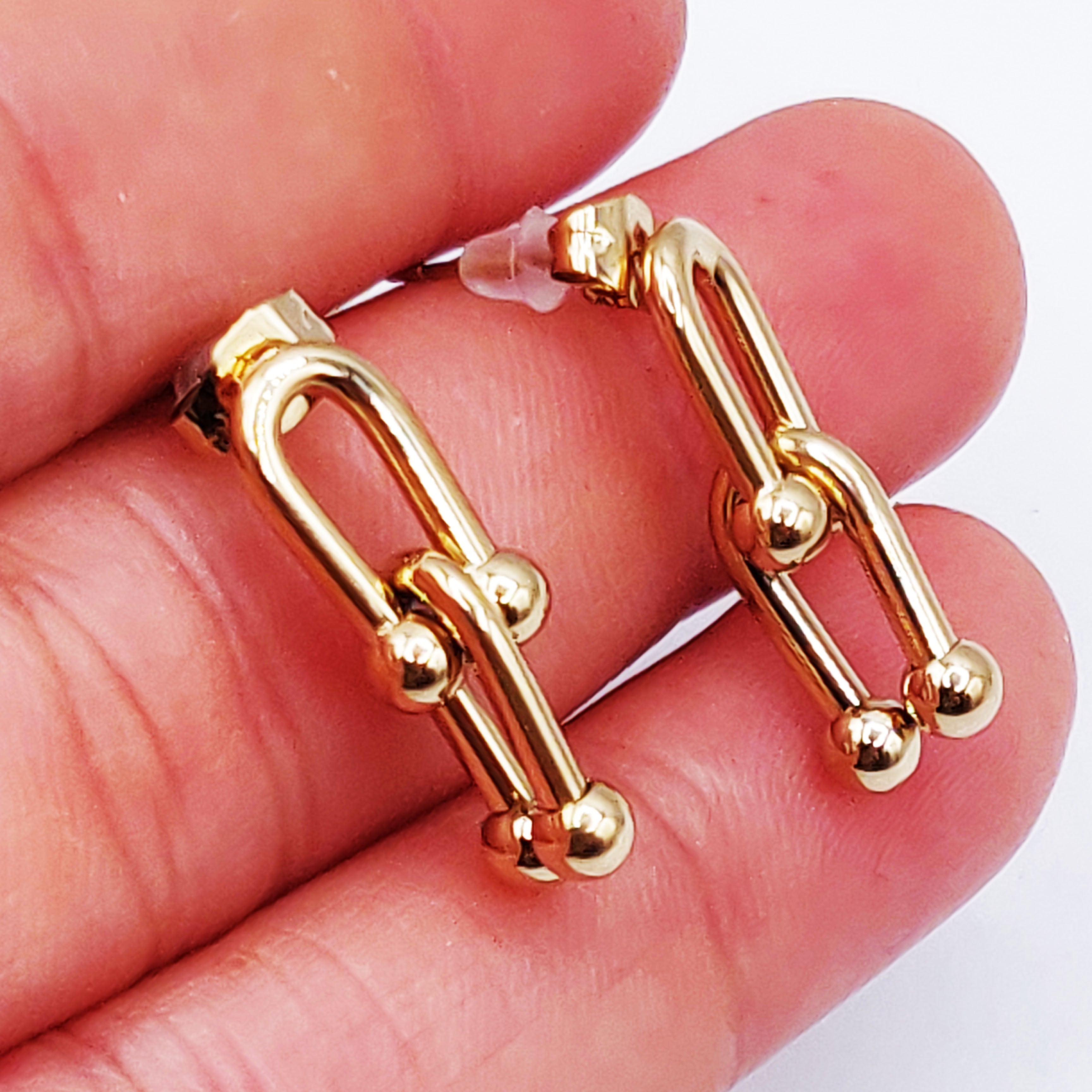 Boucles d'oreilles T Luxe