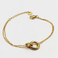 Bracelet Double Pendentif Anneaux Croisés