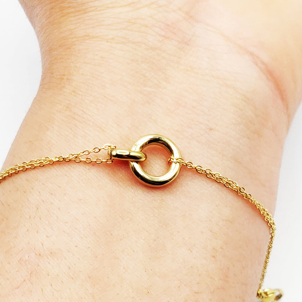 Bracelet Double Pendentif Anneaux Croisés