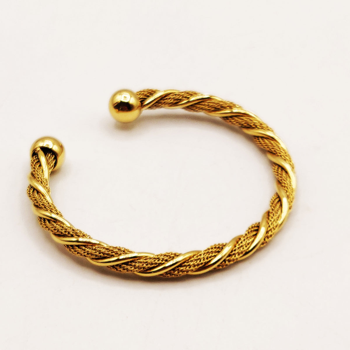 Bracelet Rigide Torsade et Boules Dorées