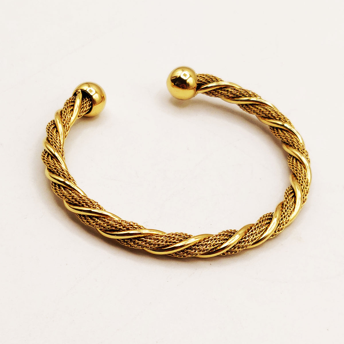 Bracelet Rigide Torsade et Boules Dorées