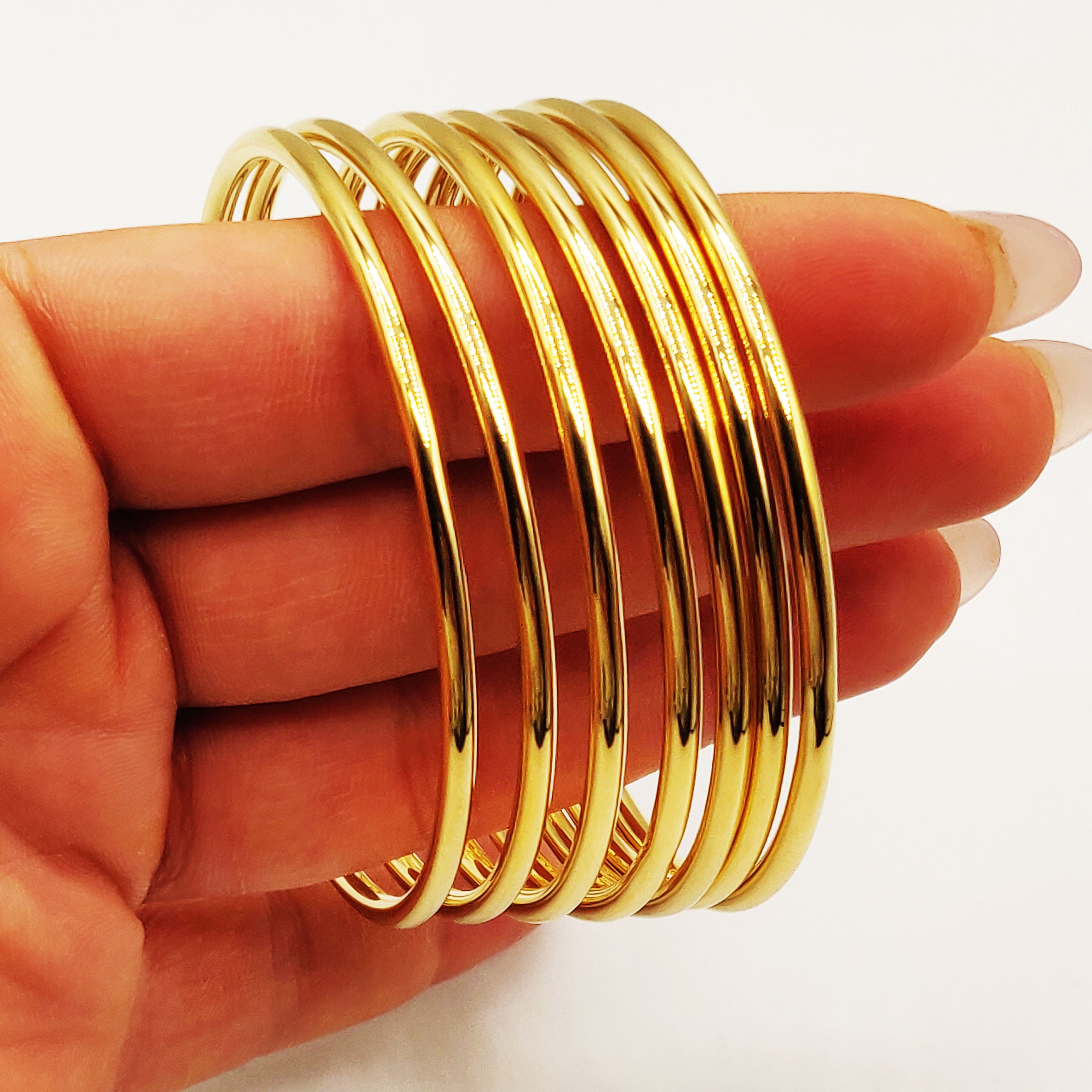 7 Bracelets Rigides Arrondis Simples
