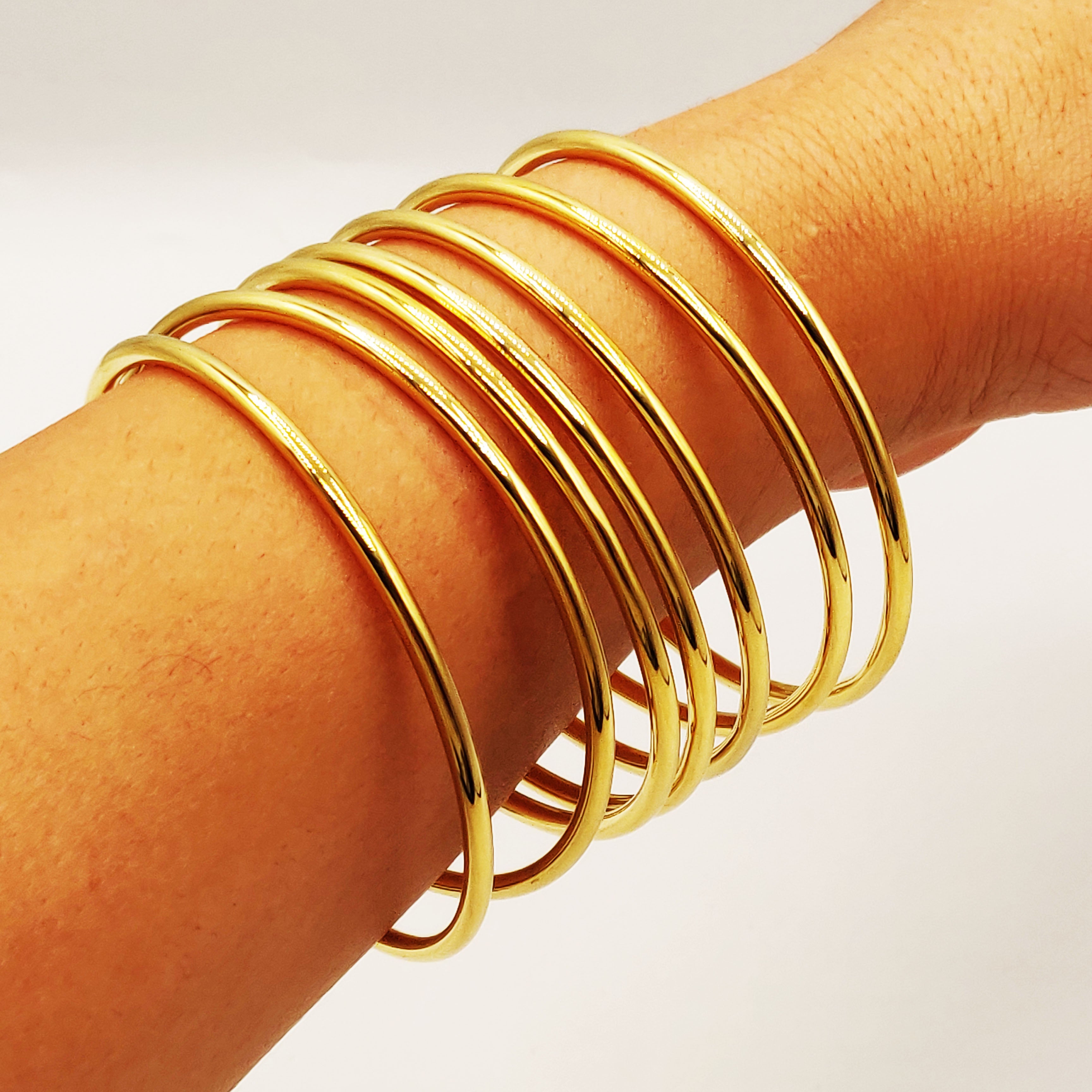7 Bracelets Rigides Arrondis Simples