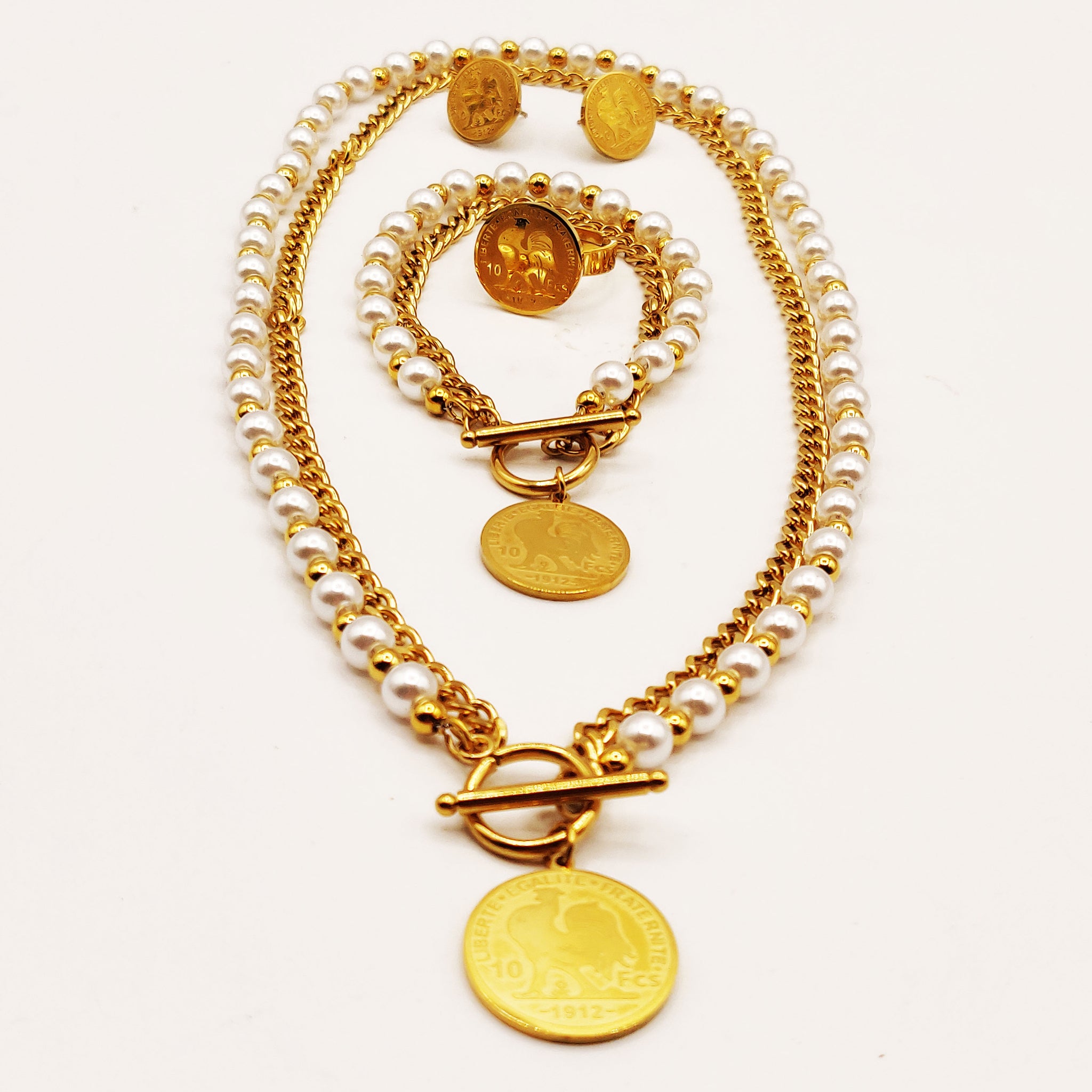 Ensemble Collier, Bracelet, Boucles d'oreilles et Bague Perles d'imitation Blanches et Dorées Lousie Coq Luxe