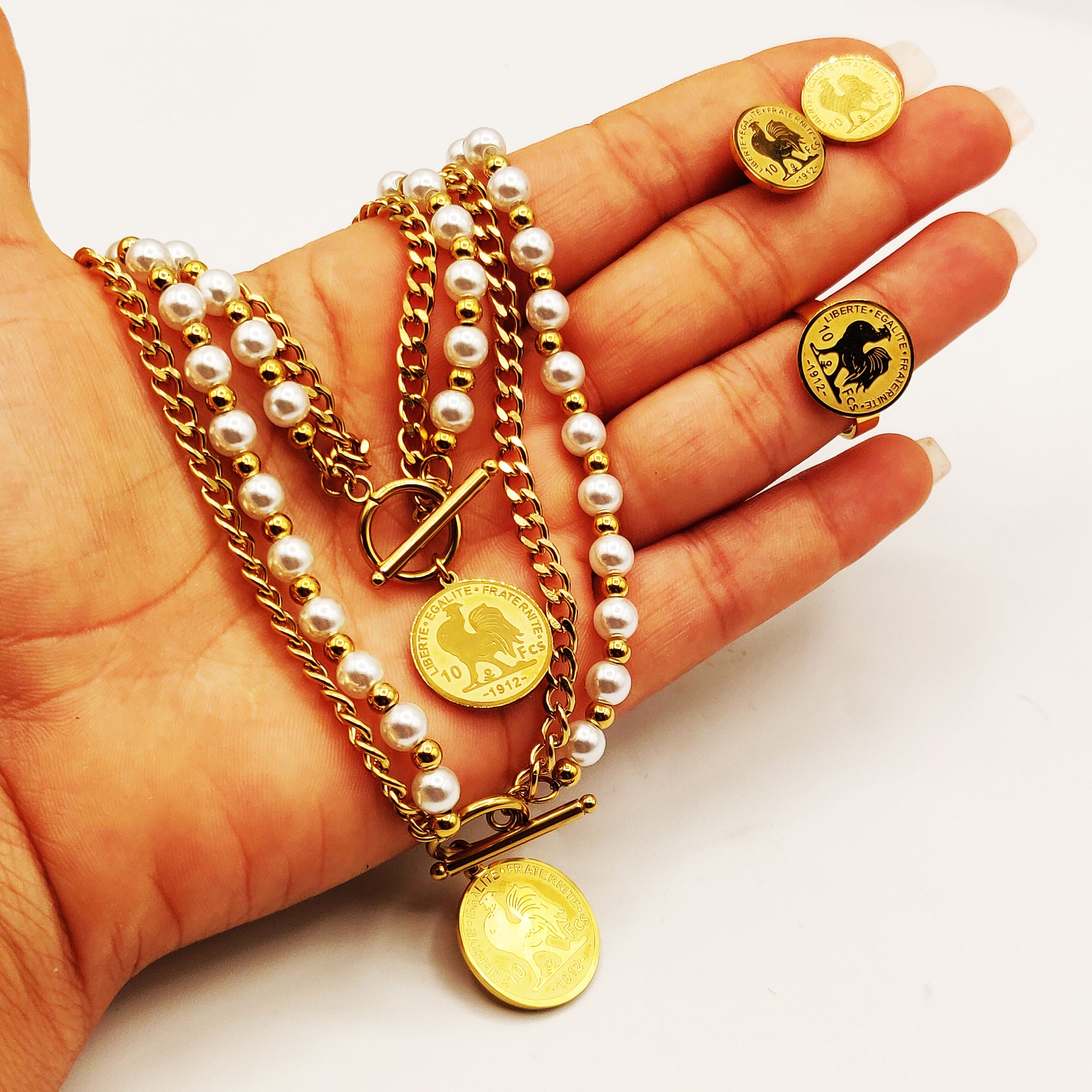 Ensemble Collier, Bracelet, Boucles d'oreilles et Bague Perles d'imitation Blanches et Dorées Lousie Coq Luxe