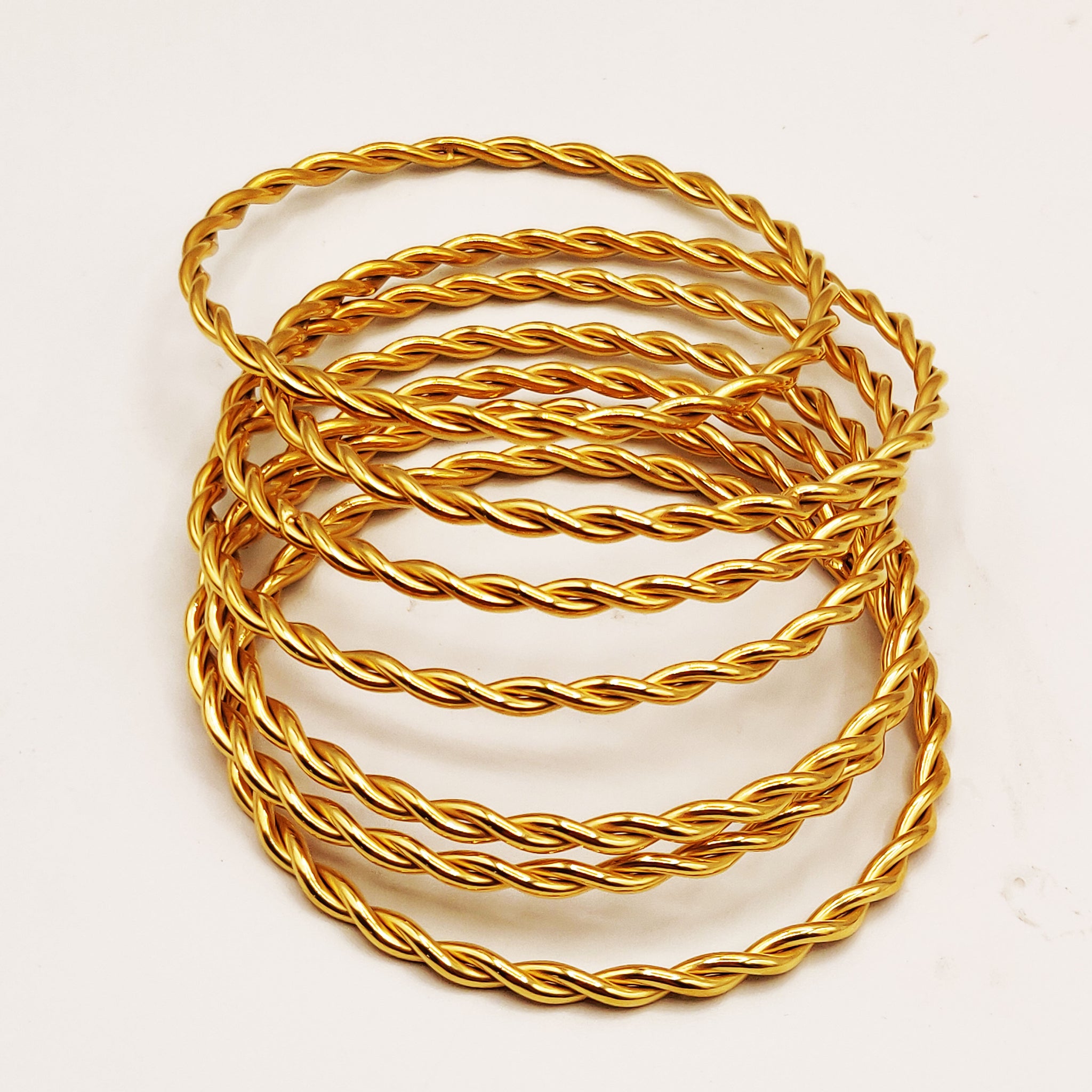 7 Bracelets Rigides Torsades Allongées Luxe