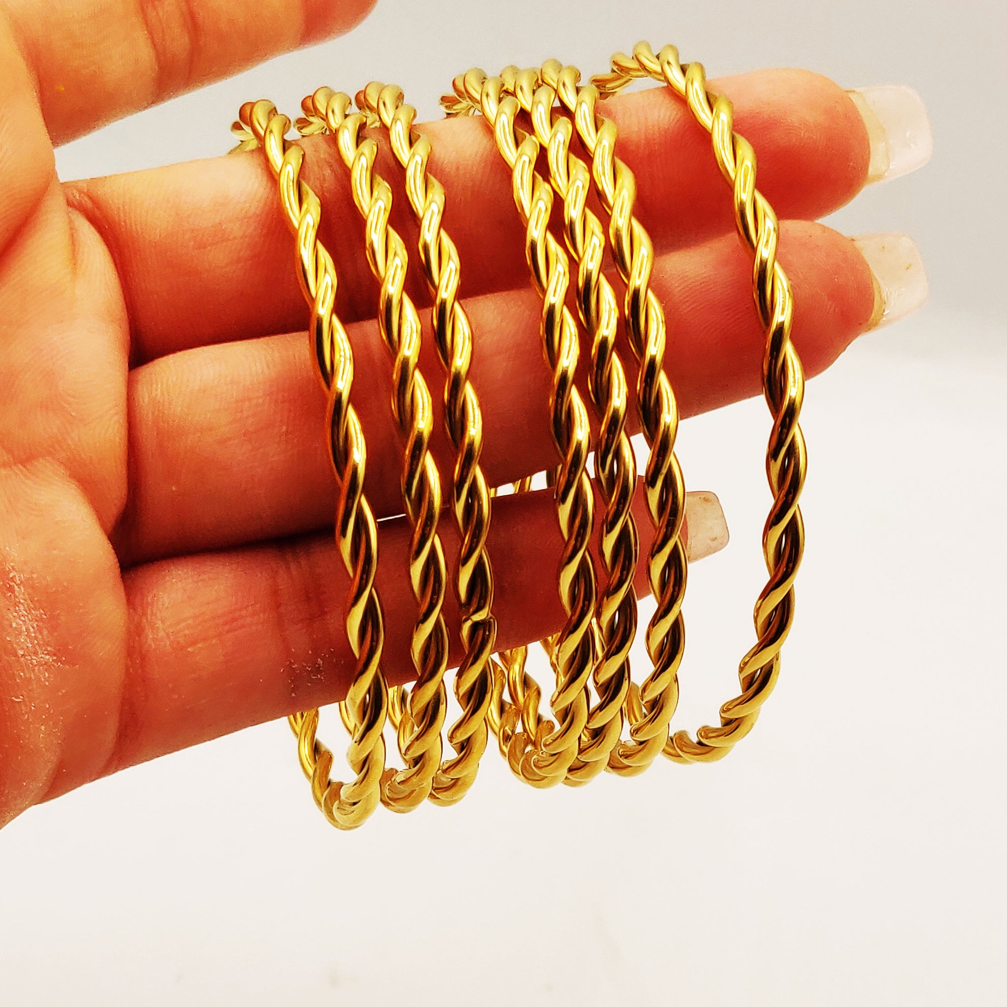 7 Bracelets Rigides Torsades Allongées Luxe