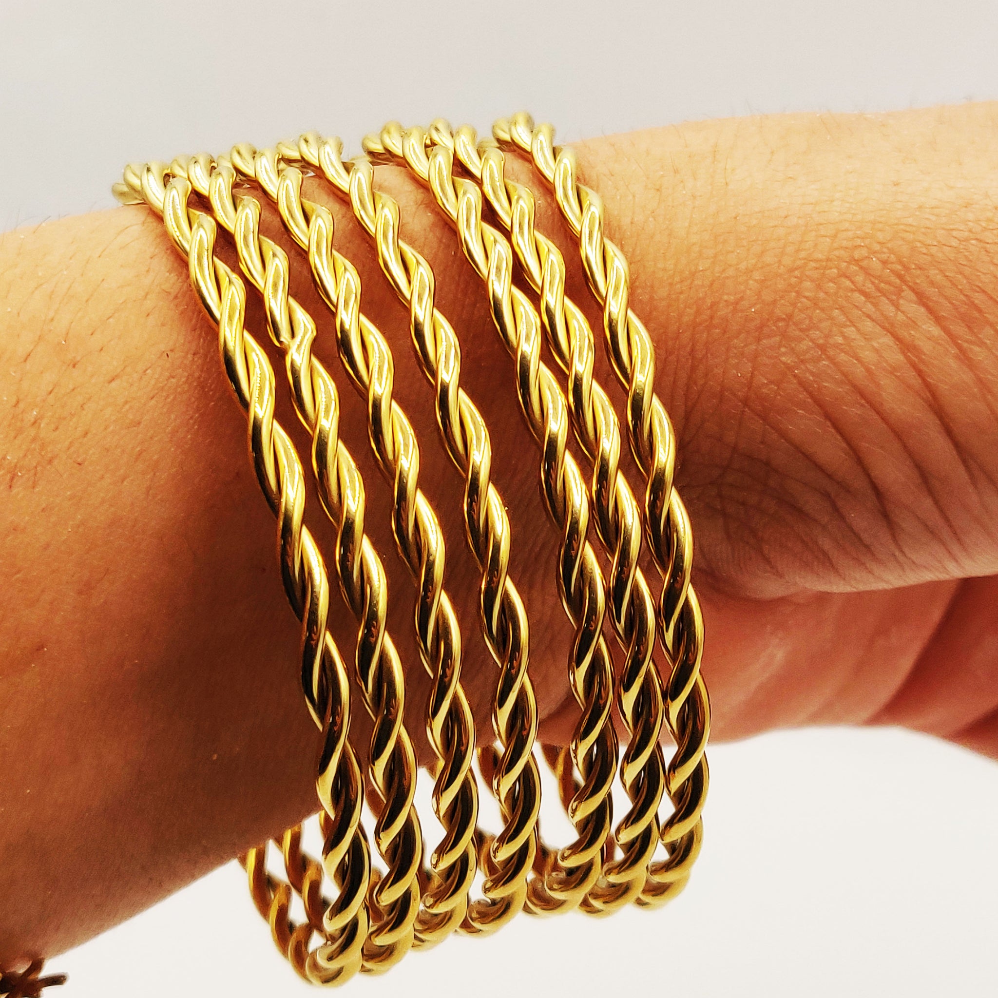 7 Bracelets Rigides Torsades Allongées Luxe
