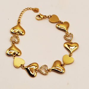 Bracelet Multi Coeurs Dorés et Tour Cristaux Luxe