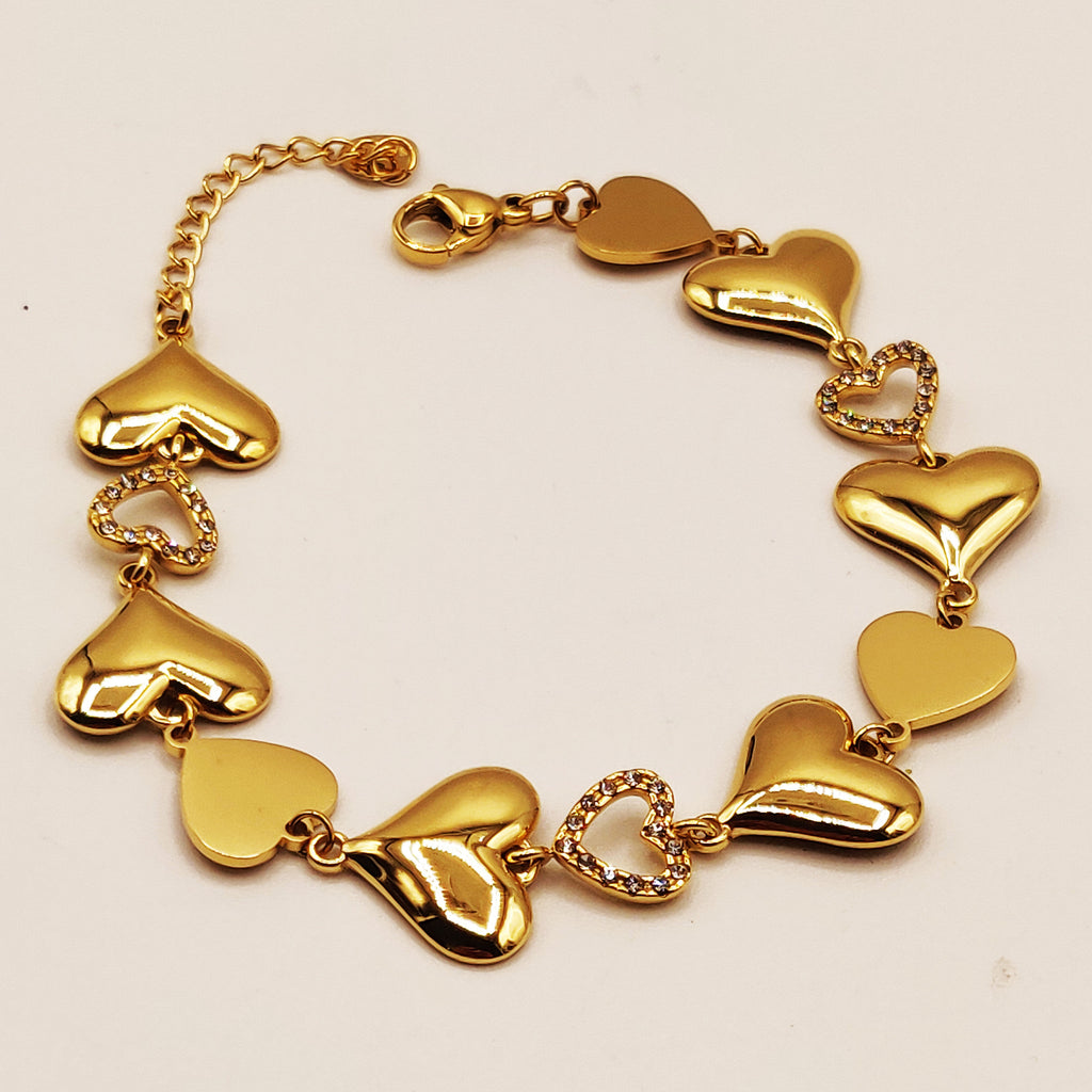 Bracelet Multi Coeurs Dorés et Tour Cristaux Luxe
