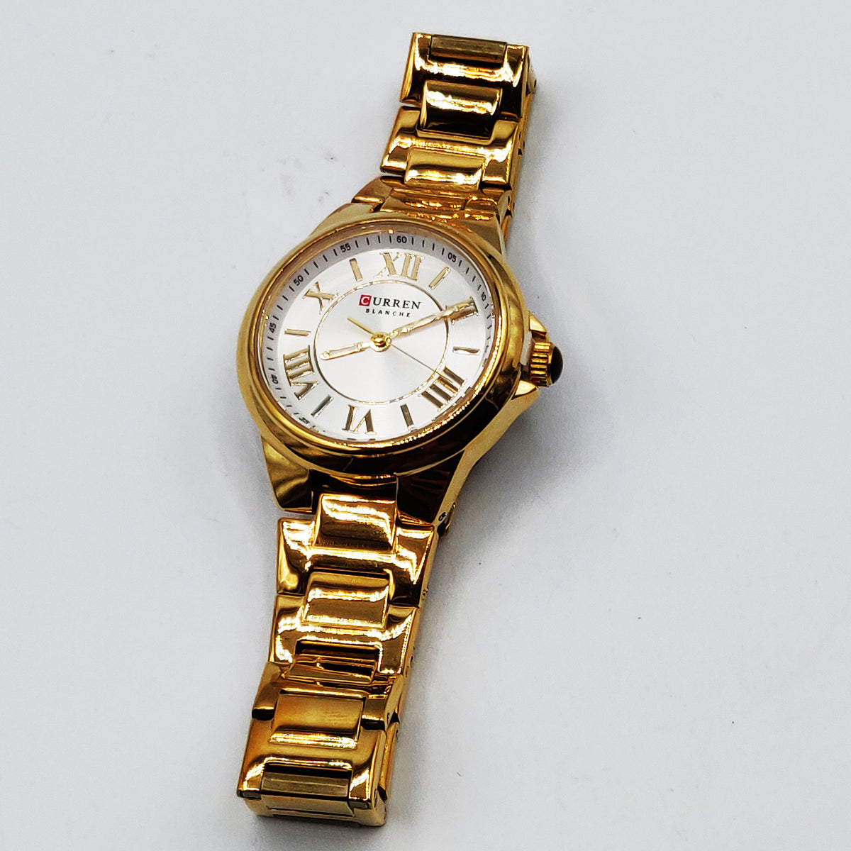 Montre Curren C9091L Bracelet Doré Fond Blanc