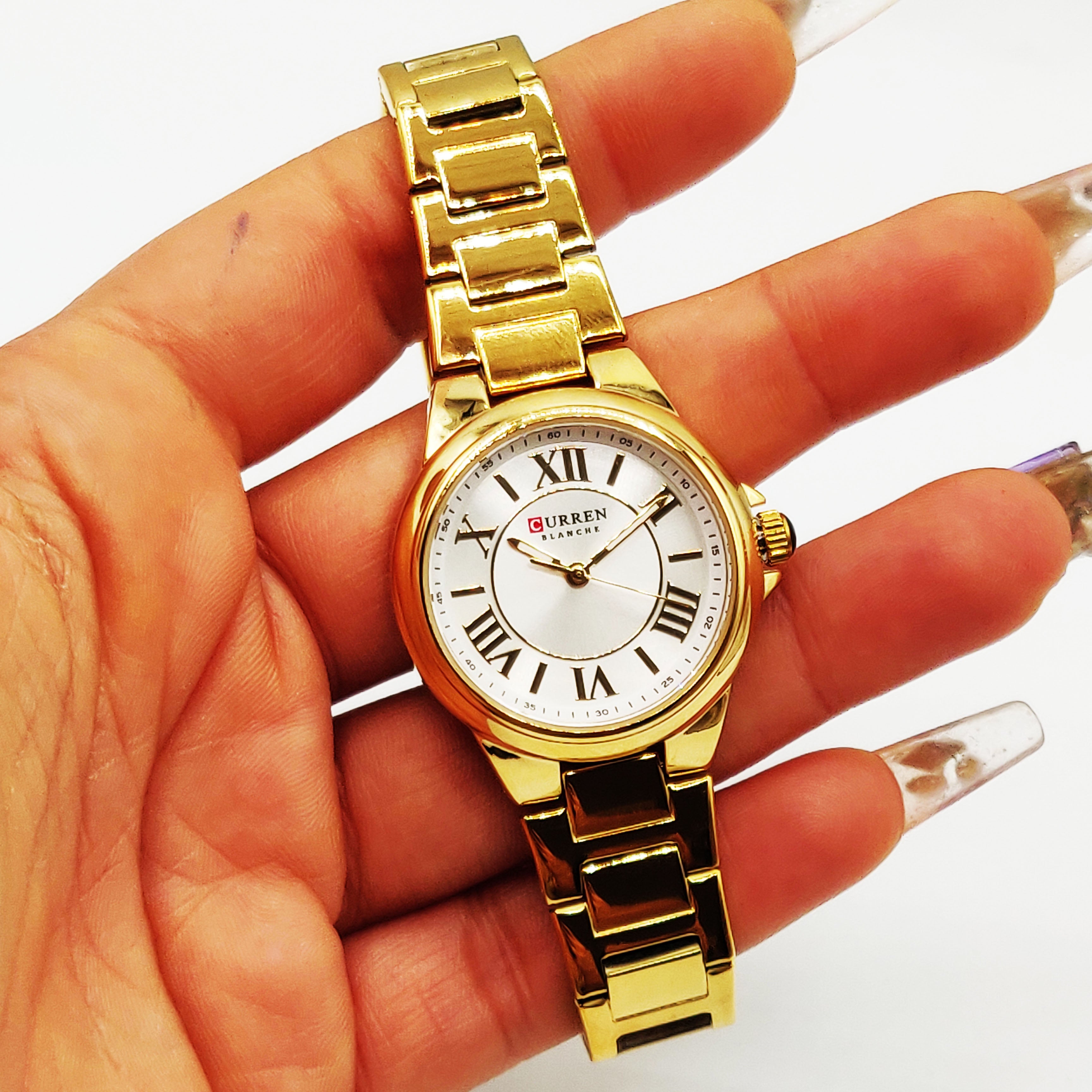 Montre Curren C9091L Bracelet Doré Fond Blanc