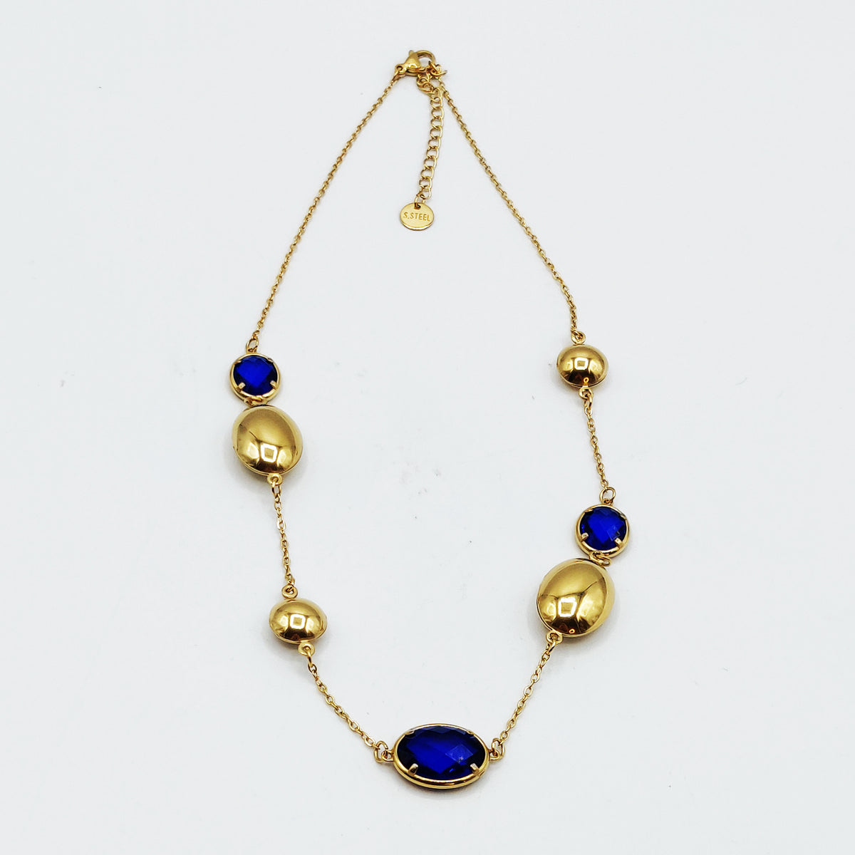 Collier Ovales Dorés et Cristaux Bleus Luxe