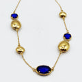 Collier Ovales Dorés et Cristaux Bleus Luxe