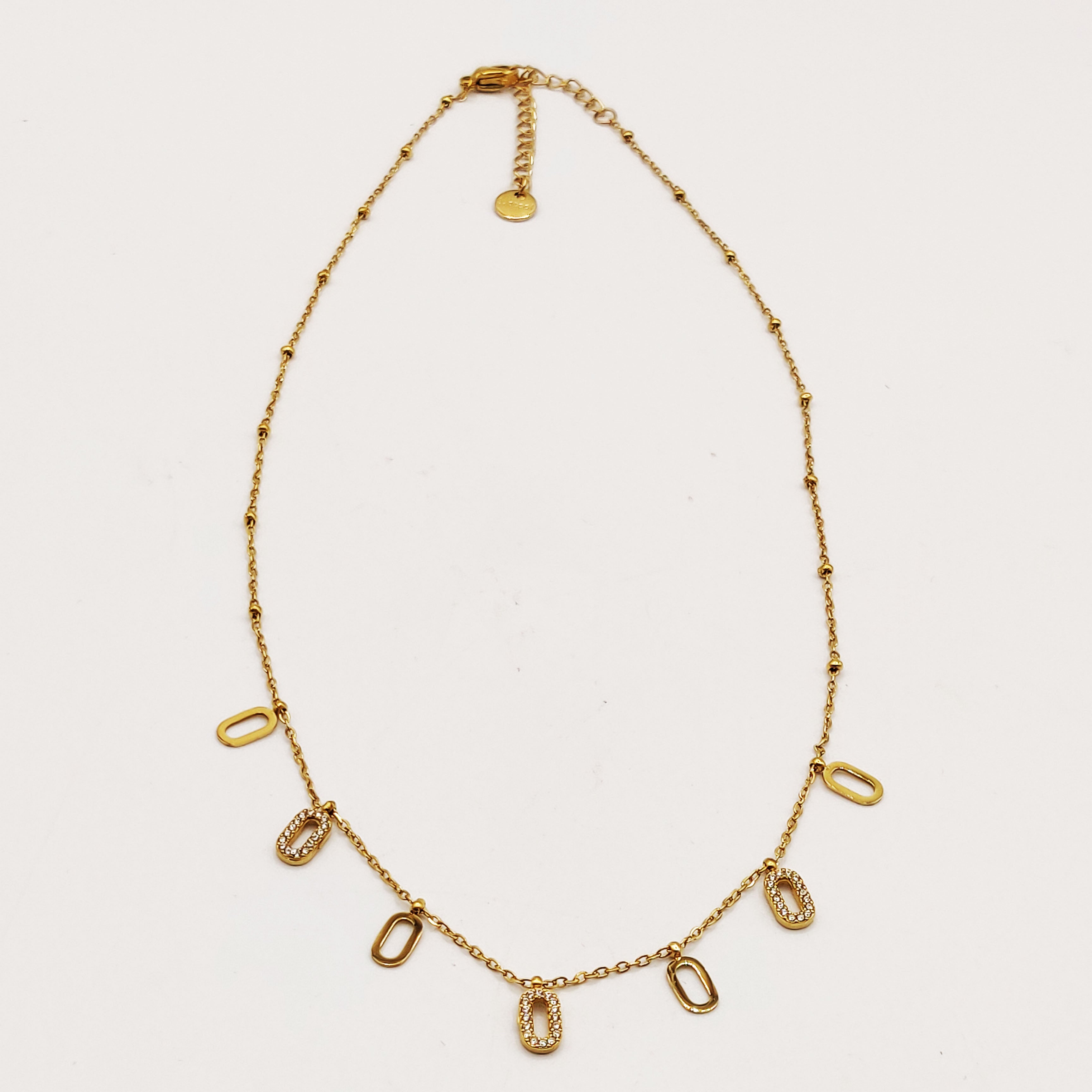 Collier Multi Ovales Dorés et Tour Cristaux Luxe