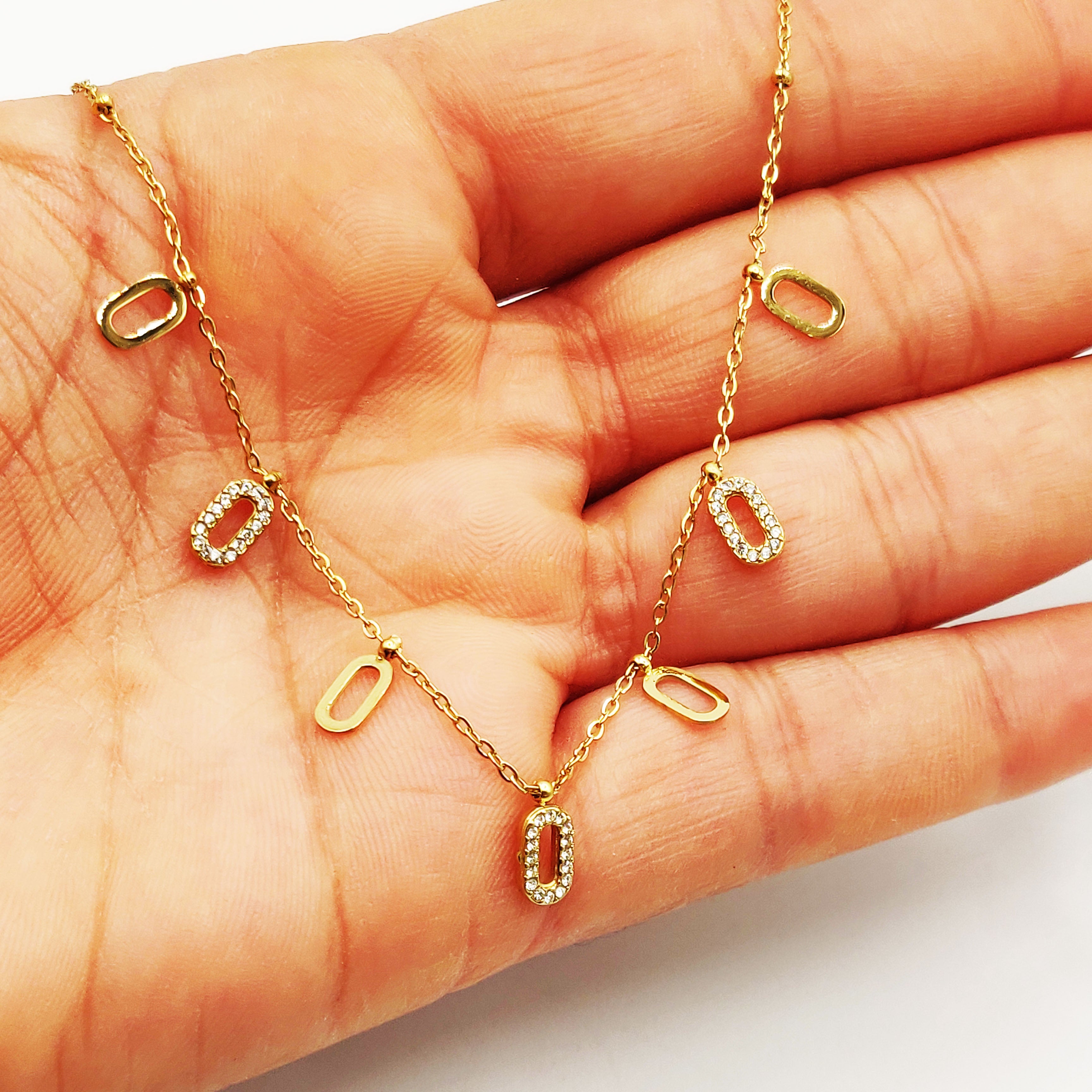 Collier Multi Ovales Dorés et Tour Cristaux Luxe