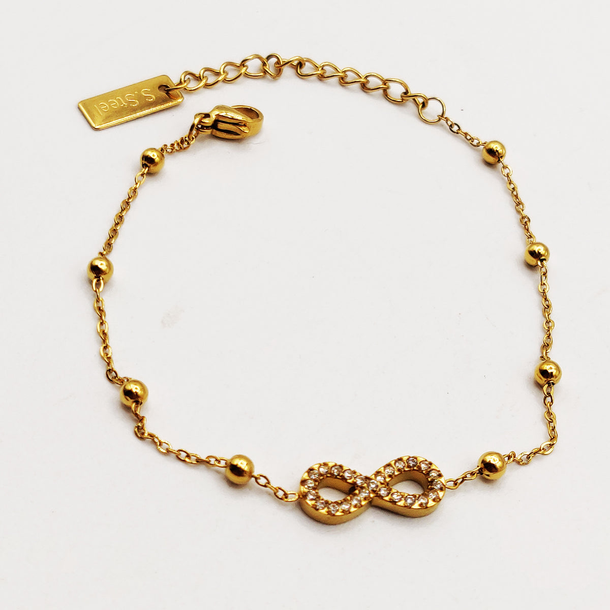 Bracelet Multi Perles d'imitation Dorées Infinity Cristaux Luxe