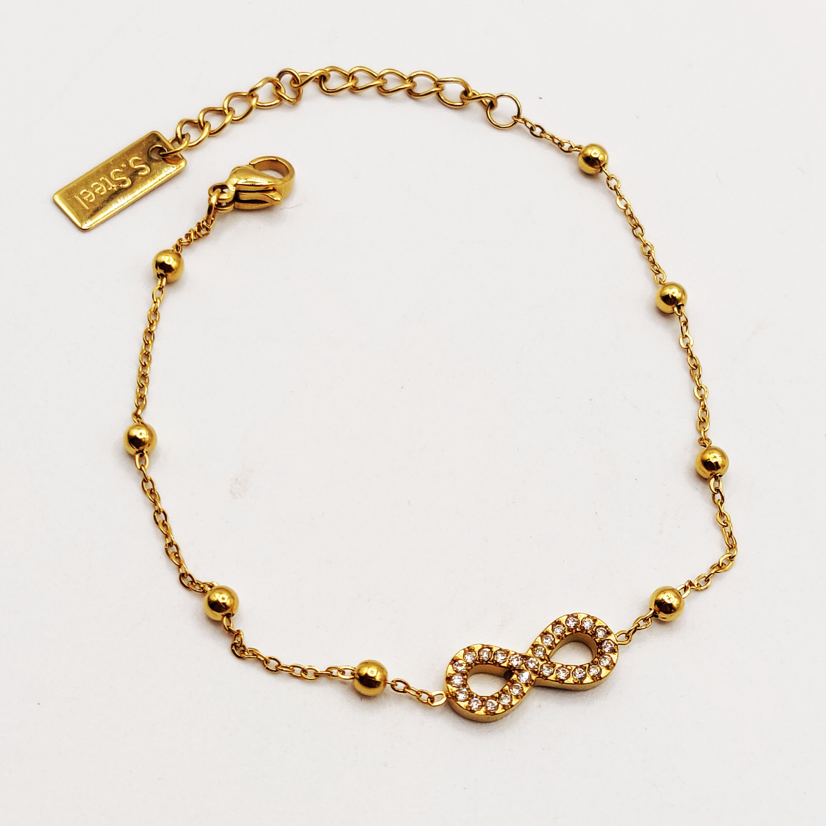 Bracelet Multi Perles d'imitation Dorées Infinity Cristaux Luxe