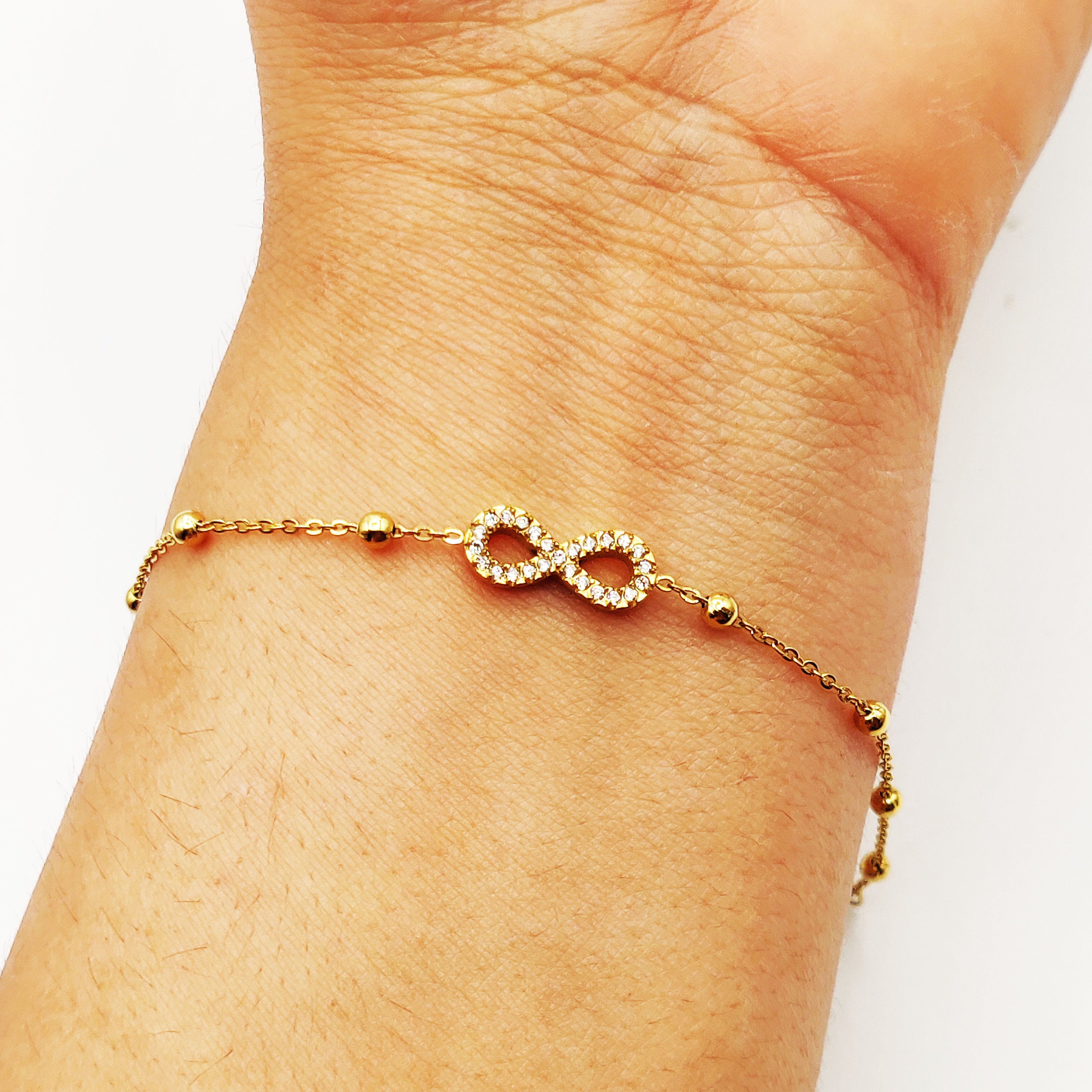 Bracelet Multi Perles d'imitation Dorées Infinity Cristaux Luxe