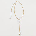 Collier et Chaîne de Dos Perles d'imitation Blanches Descendant