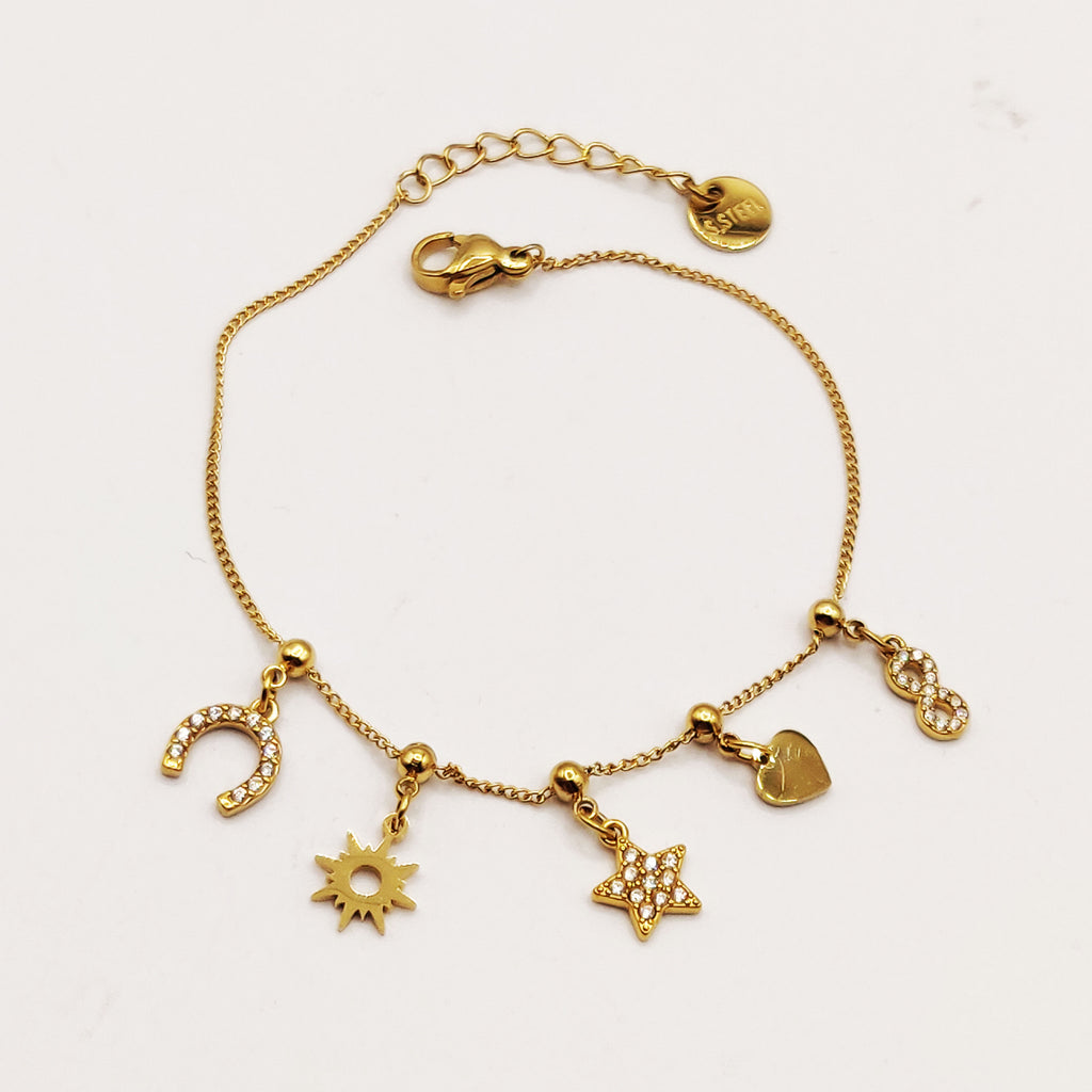 Bracelet Perles d'imitation Dorées Multi Pendentifs Étoile Cristaux Luxe
