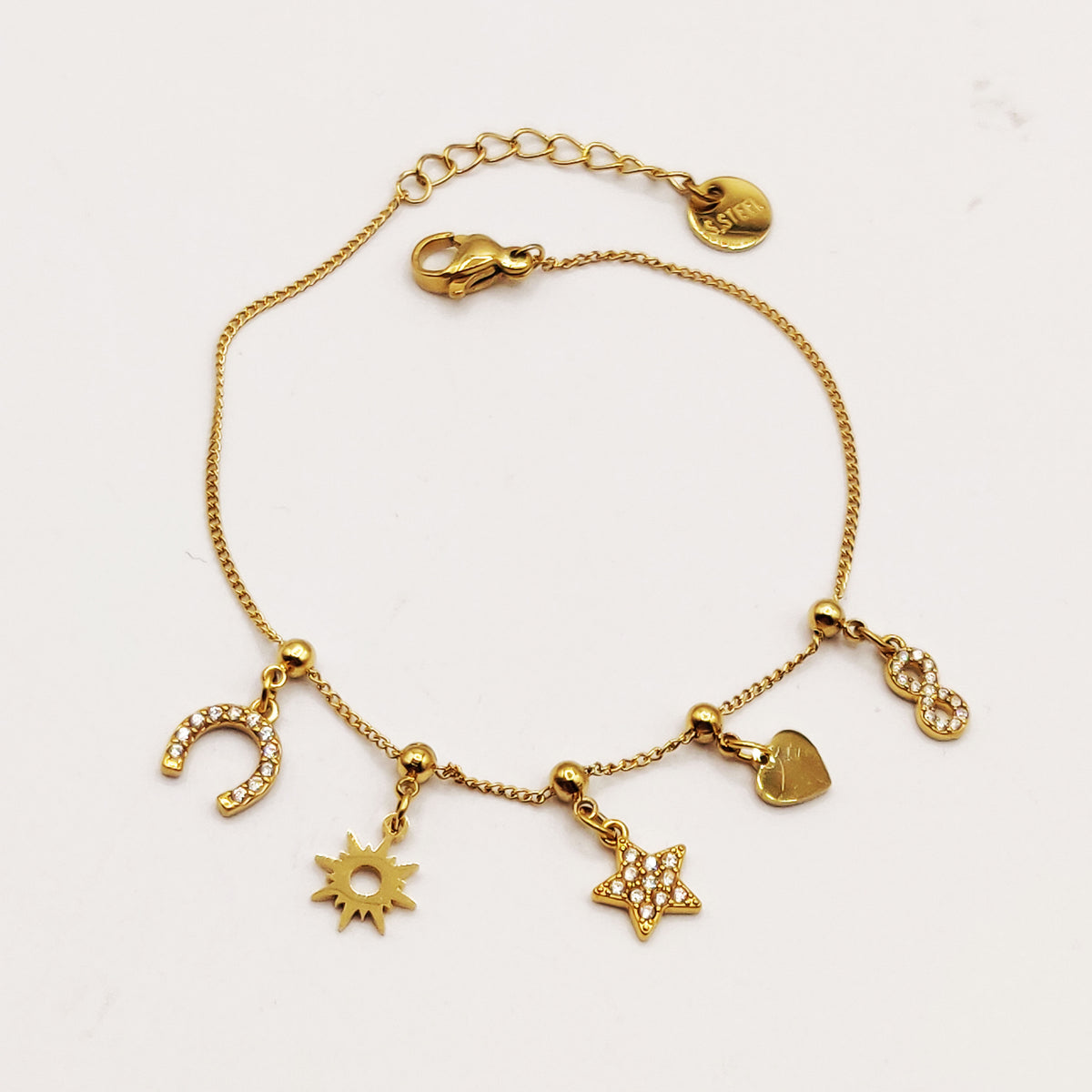 Bracelet Perles d'imitation Dorées Multi Pendentifs Étoile Cristaux Luxe