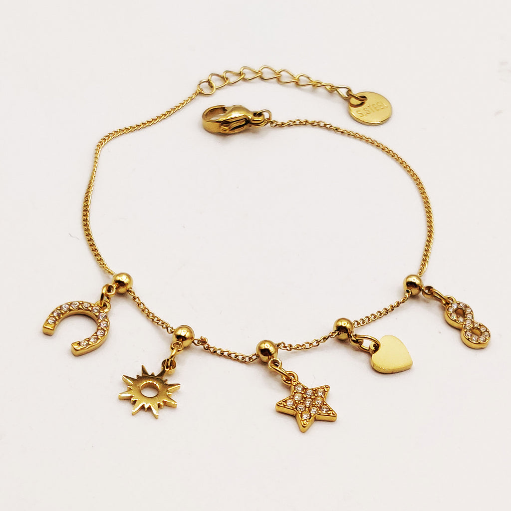 Bracelet Perles d'imitation Dorées Multi Pendentifs Étoile Cristaux Luxe