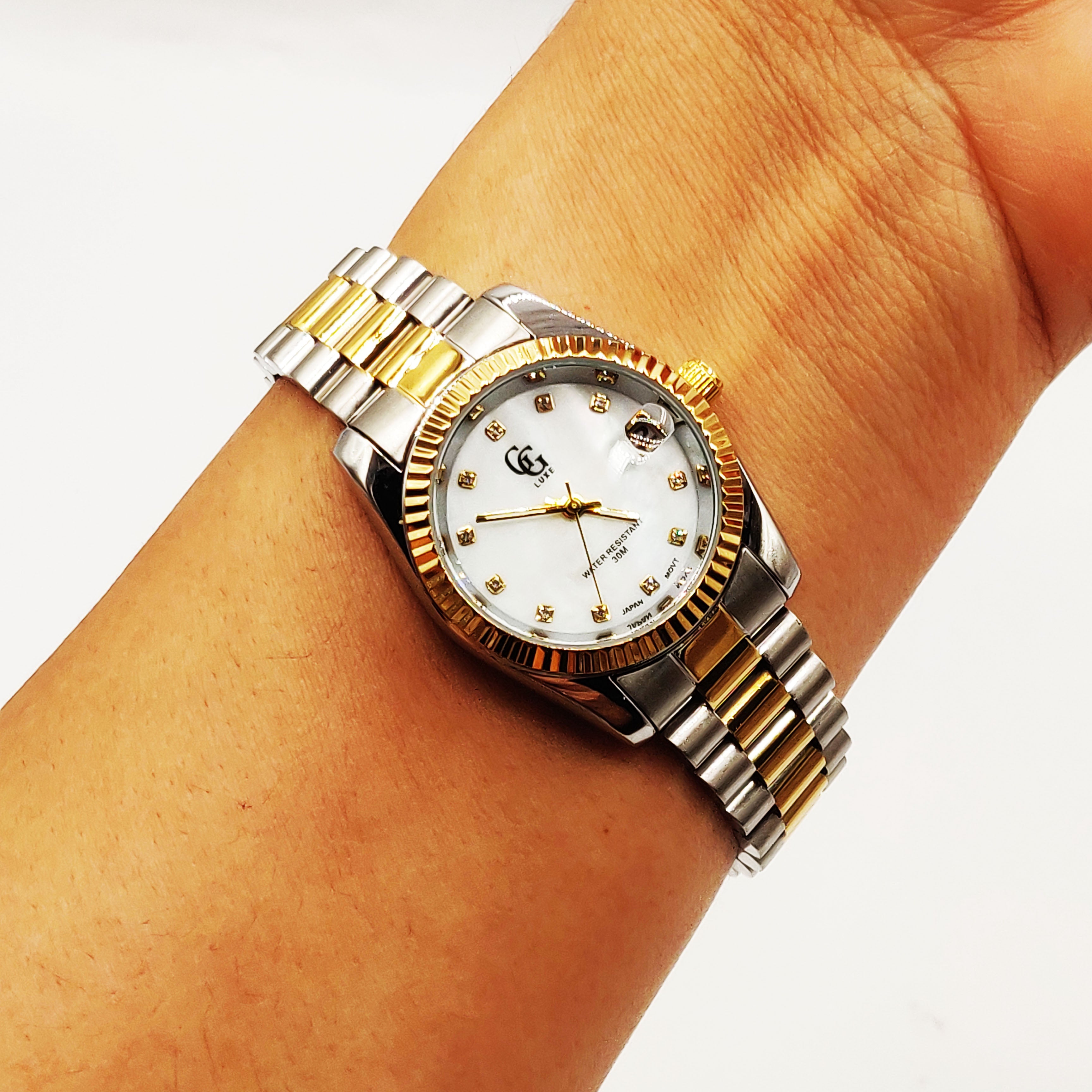 Montre GG Luxe FB1912 Bracelet Argenté et Doré Fond Blanc
