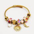 Bracelet Rigide Charmes Soleil, Lune et Étoile Luxe