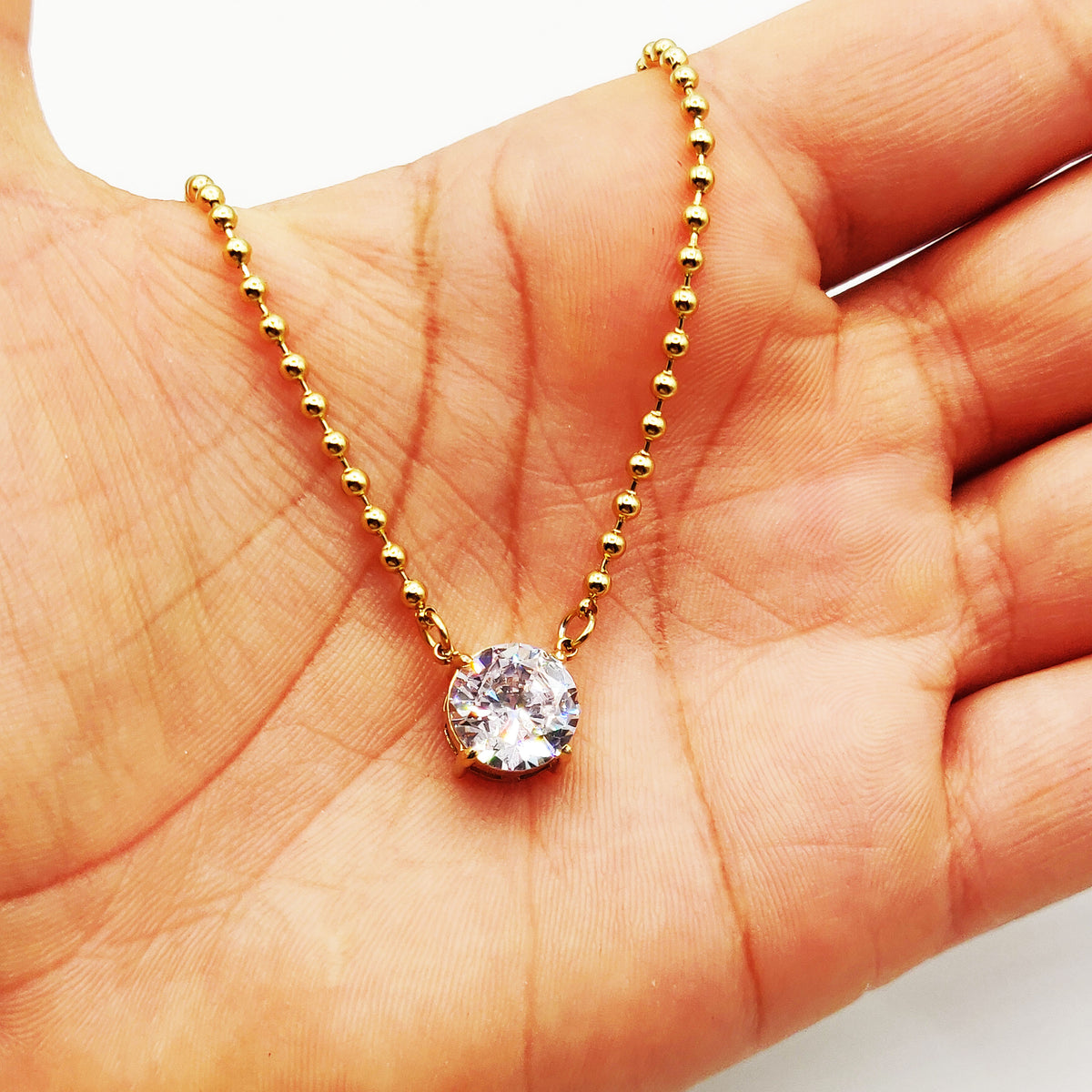 Collier Chaîne en Perles d'imitation Dorées Gros Cristal Rond Luxe
