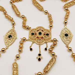 Bijou de Dos Motif Oriental Pierres Vertes et Rouges