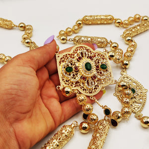 Bijou de Dos Motif Oriental Pierres Vertes et Rouges