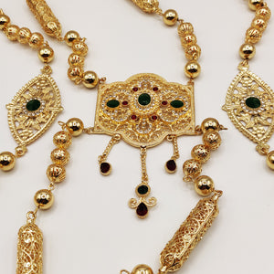 Bijou de Dos Motif Oriental Pierres Vertes et Rouges