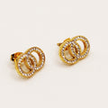 Boucles d'oreilles Double Cercles Croisés Luxe