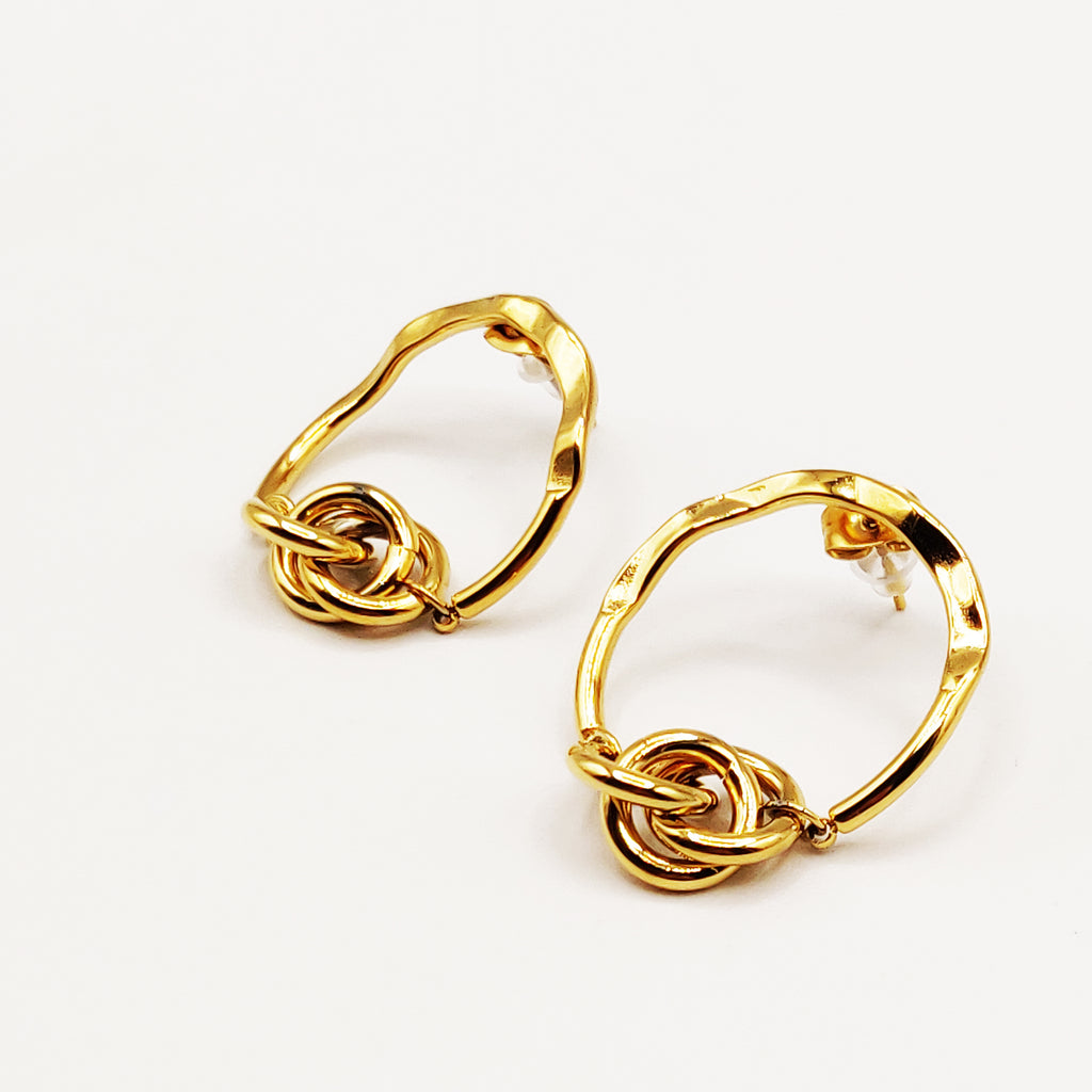 Boucles d'oreilles Triple Anneaux Croisés